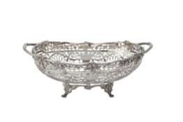 A silver twin handled oblong fruit bowl by Goldsmiths & Silversmiths Co. Ltd.