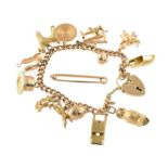 A vintage curb link charm bracelet