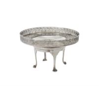 An Edwardian silver bowl and stand by Goldsmiths & Silversmiths Co. Ltd.