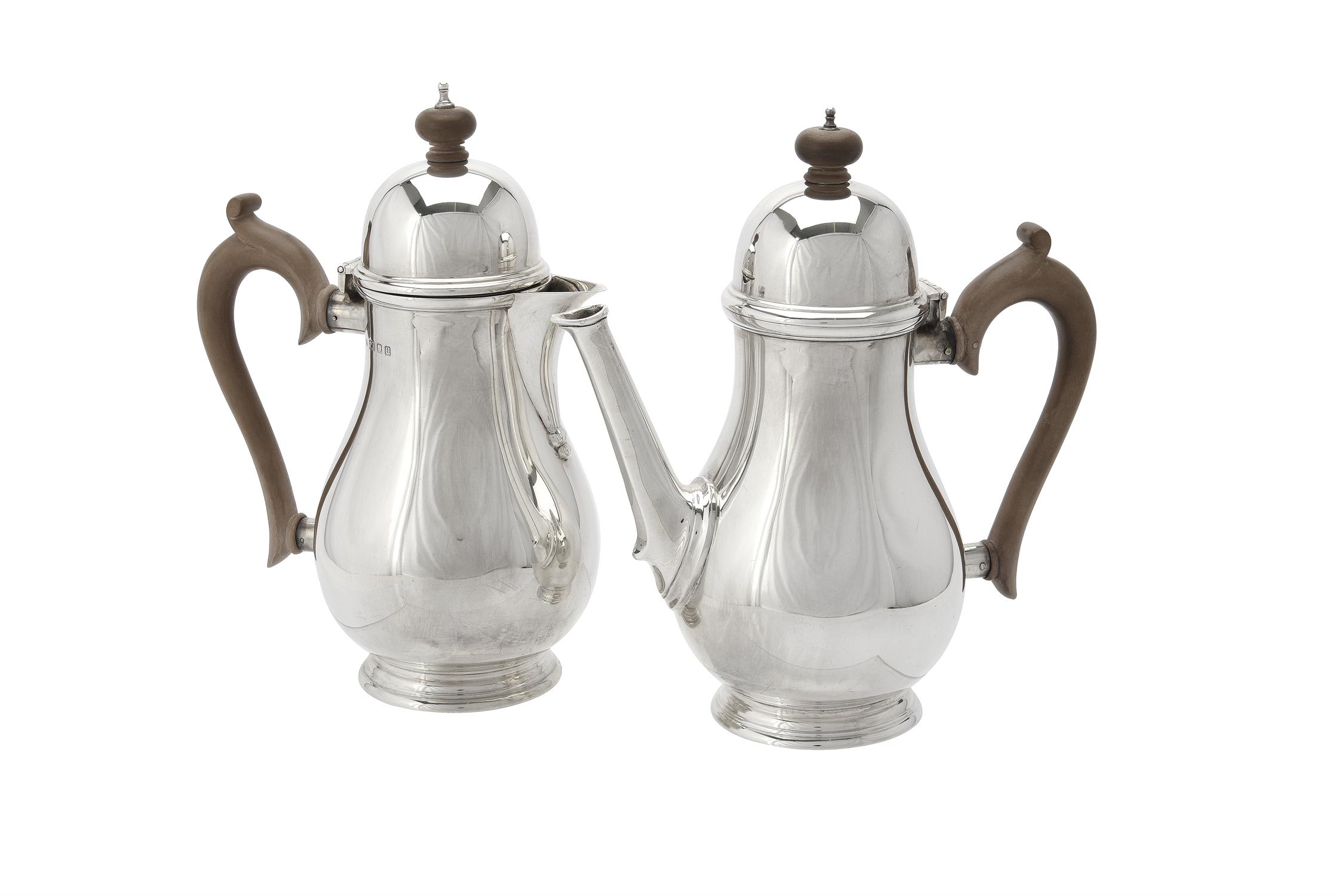 A silver baluster coffee pot and hot water jug by Blackmore & Fletcher Ltd.