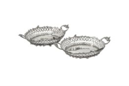 Two Dutch silver twin handled oval baskets