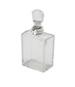 An Edwardian silver mounted lockable glass decanter