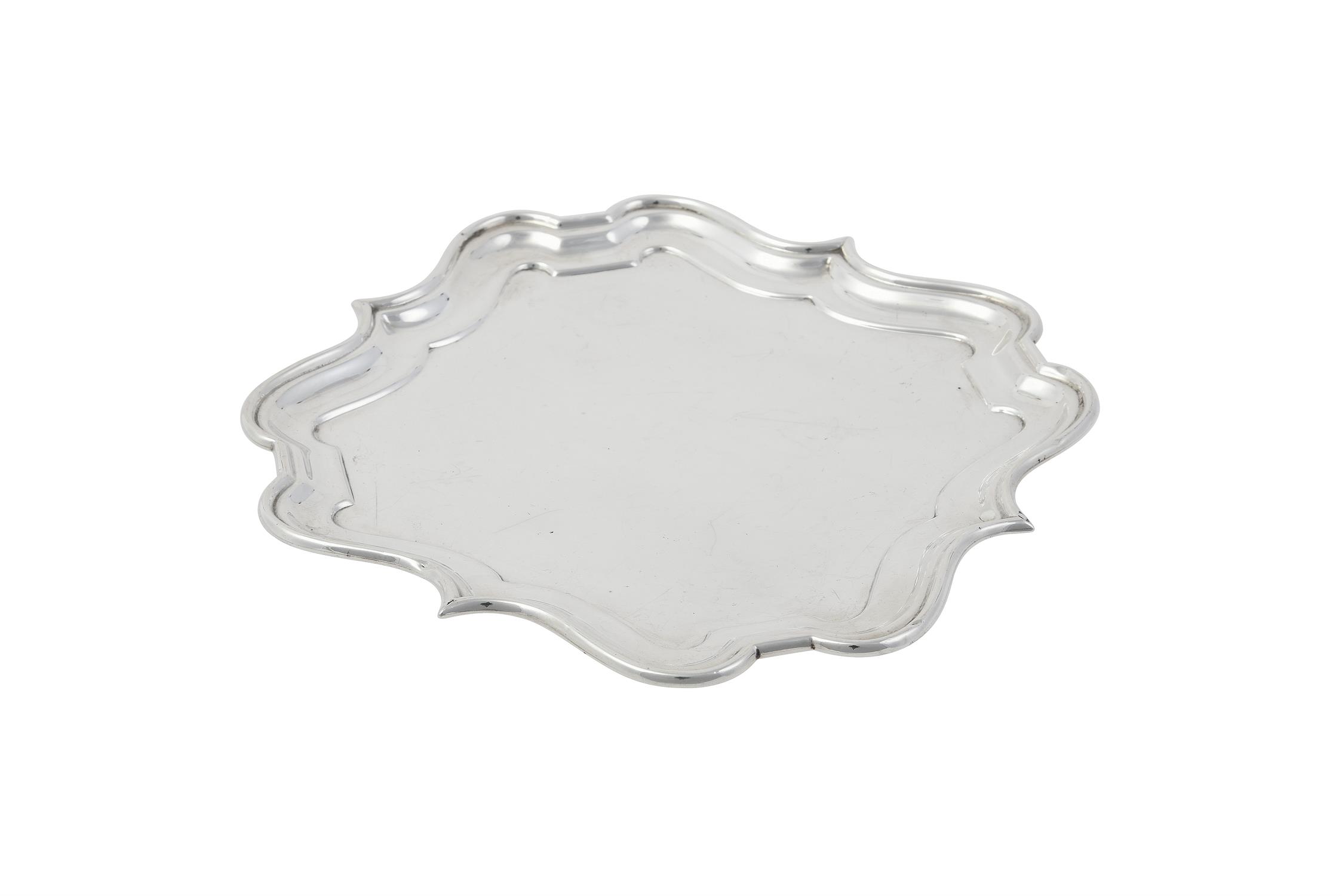 An Edwardian silver shaped square salver by William Aitken
