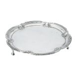 A silver shaped circular salver by Elkington & Co. Ltd.