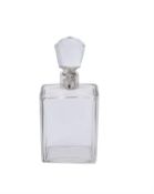 A silver mounted lockable glass decanter by Hukin & Heath Ltd.