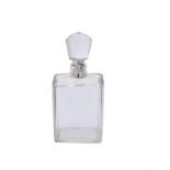 A silver mounted lockable glass decanter by Hukin & Heath Ltd.