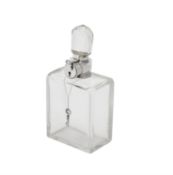 A silver mounted lockable glass decanter by Hukin & Heath Ltd.