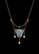 A turquoise matrix and freshwater pearl pendant necklace by Murrle Bennett & Co.