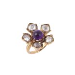 A diamond and amethyst flower head cluster ring