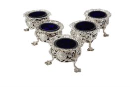 A Victorian matched set of five silver pierced cauldron salts