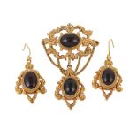 A pair of 1960s garnet earrings and brooch