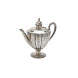 Y A Victorian silver lobed and fluted tea pot by Martin, Hall & Co.