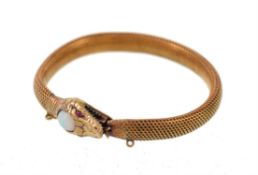 A 1920s 15 carat gold serpent bracelet