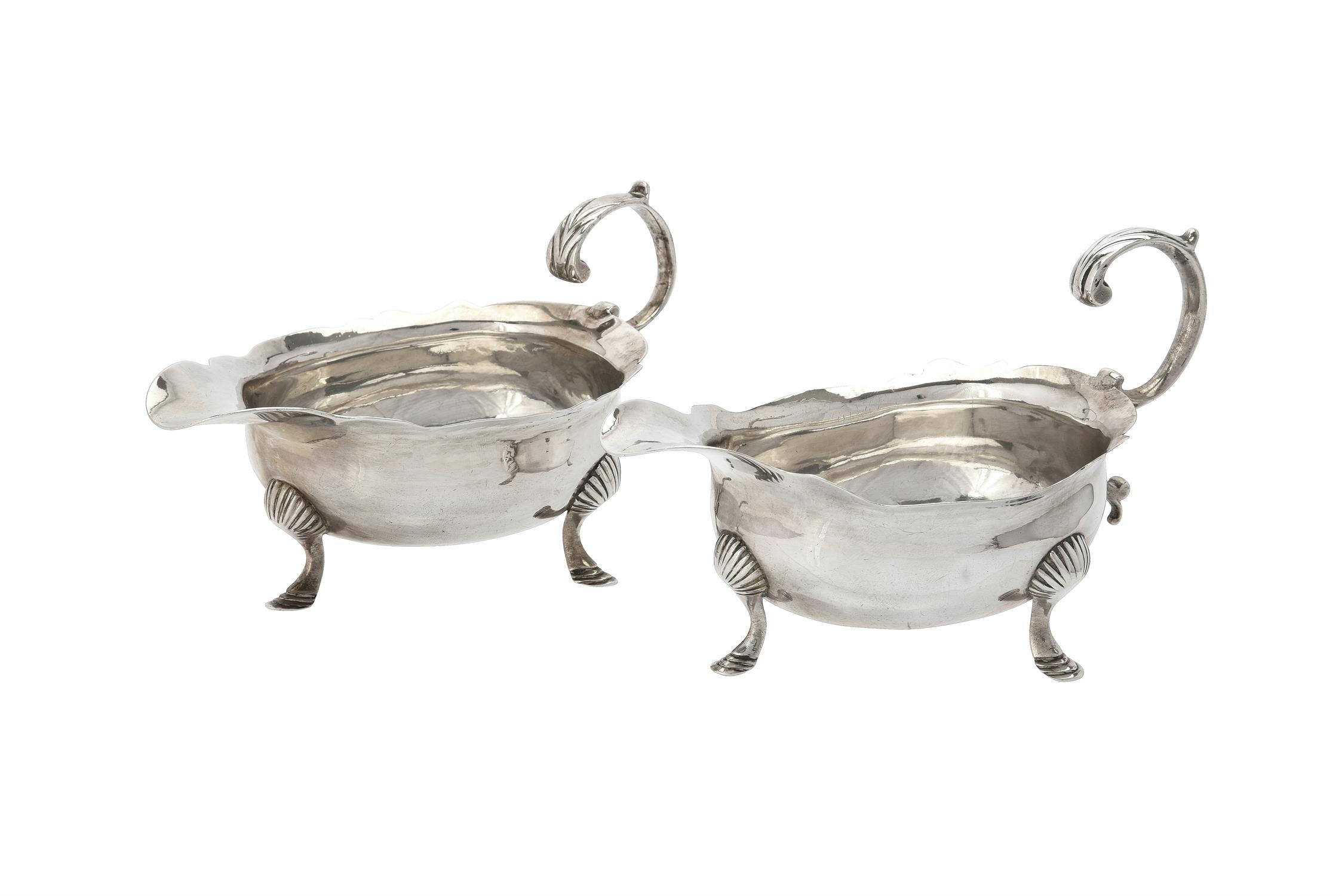 A George II silver shaped oval sauce boat