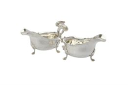 A pair of Edwardian silver shaped oval sauce boats by George Nathan & Ridley Hayes