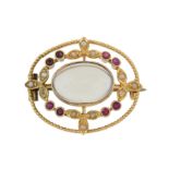 A 1920s gold Murrle Bennett & Co. ruby, seed pearl and moonstone brooch