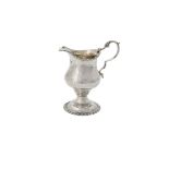 A George III silver cream jug by Thomas Shepherd