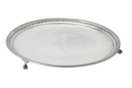 A silver circular salver by James Dixon & Son
