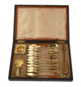 A cased French silver gilt set of twelve tea spoons