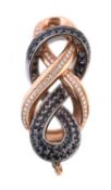 A diamond and sapphire knot pendant