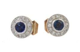 A pair of sapphire and diamond cluster ear studs