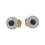 A pair of sapphire and diamond cluster ear studs