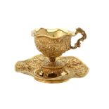 A French silver gilt cup and saucer by François Durand