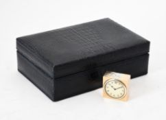 An Edwardian silver gilt cased square desk clock Arthur Baume & Co.