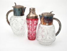 Two electro-plated mounted cut glass lemonade jugs