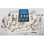 A collection of silver and silver coloured flatware