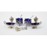 A pair of George IV silver circular salts by Joseph Willmore