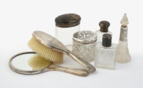 A collection of silver and silver mounted dressing table items