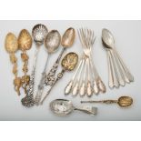 A collection of silver and silver coloured spoons