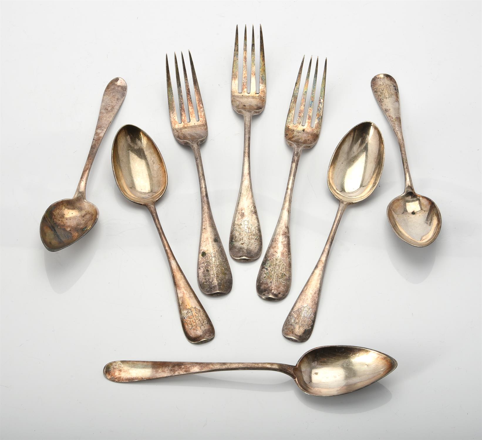 Three Russian silver table forks and three dessert spoons by Khlebnikov