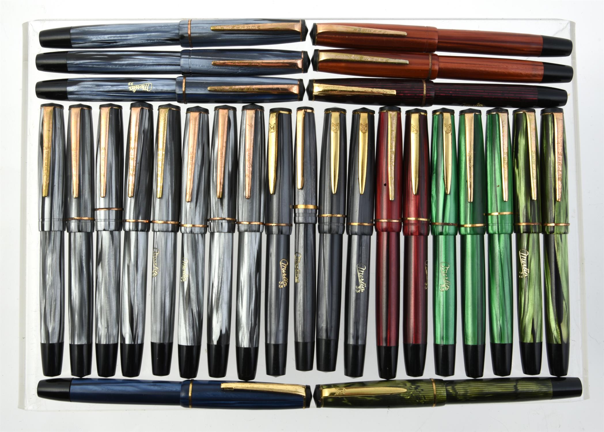 A collection of Merlin fountain pens