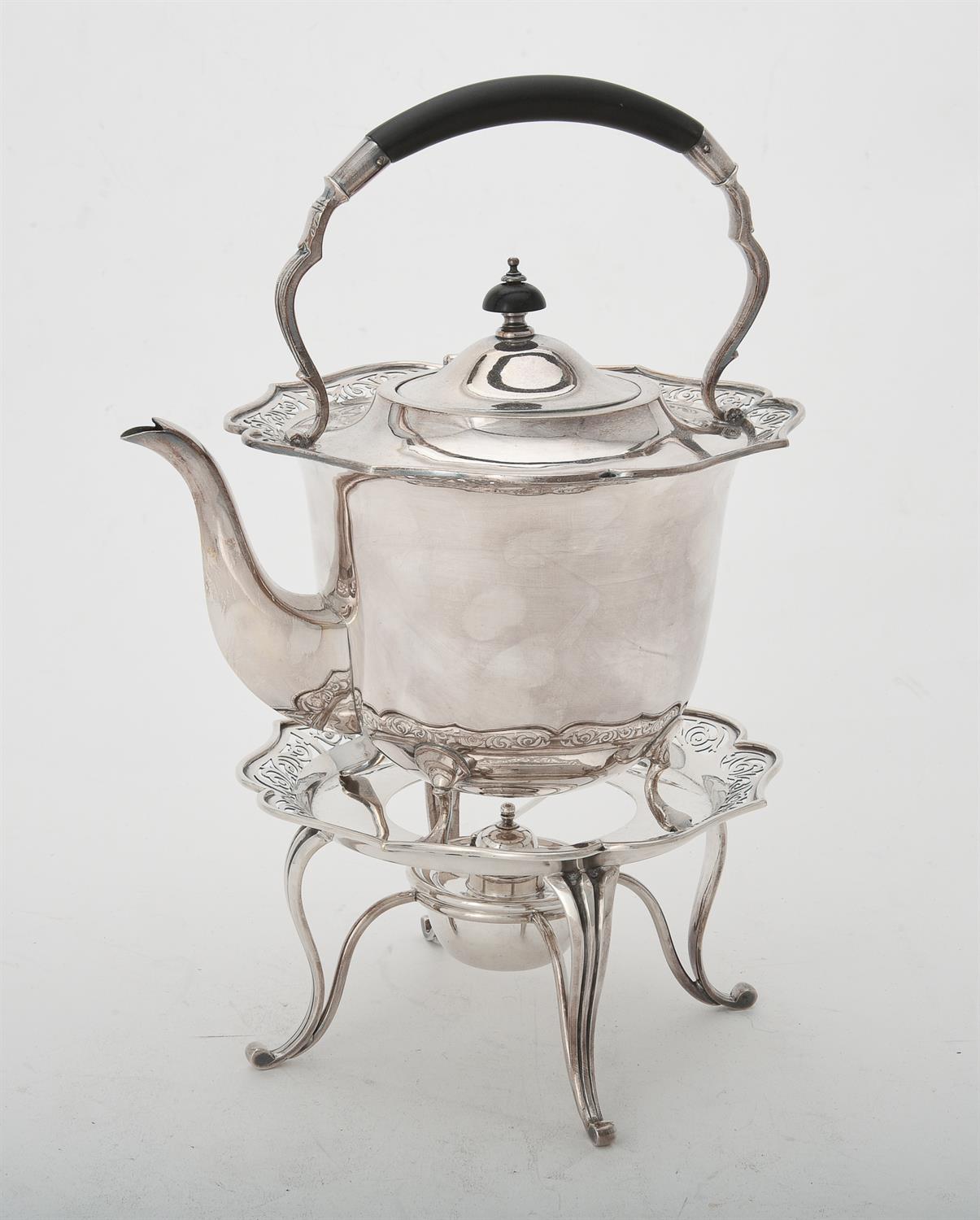 An electro-plated kettle on stand