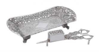 A continental silver coloured snuffers tray