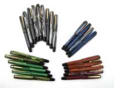 A collection of Merlin fountain pens