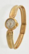 Baume,Lady's 9 carat gold bracelet watch