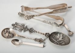 A collection of silver flatware