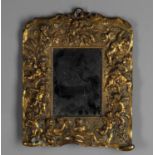 A 19th century French small gilt metal mirror