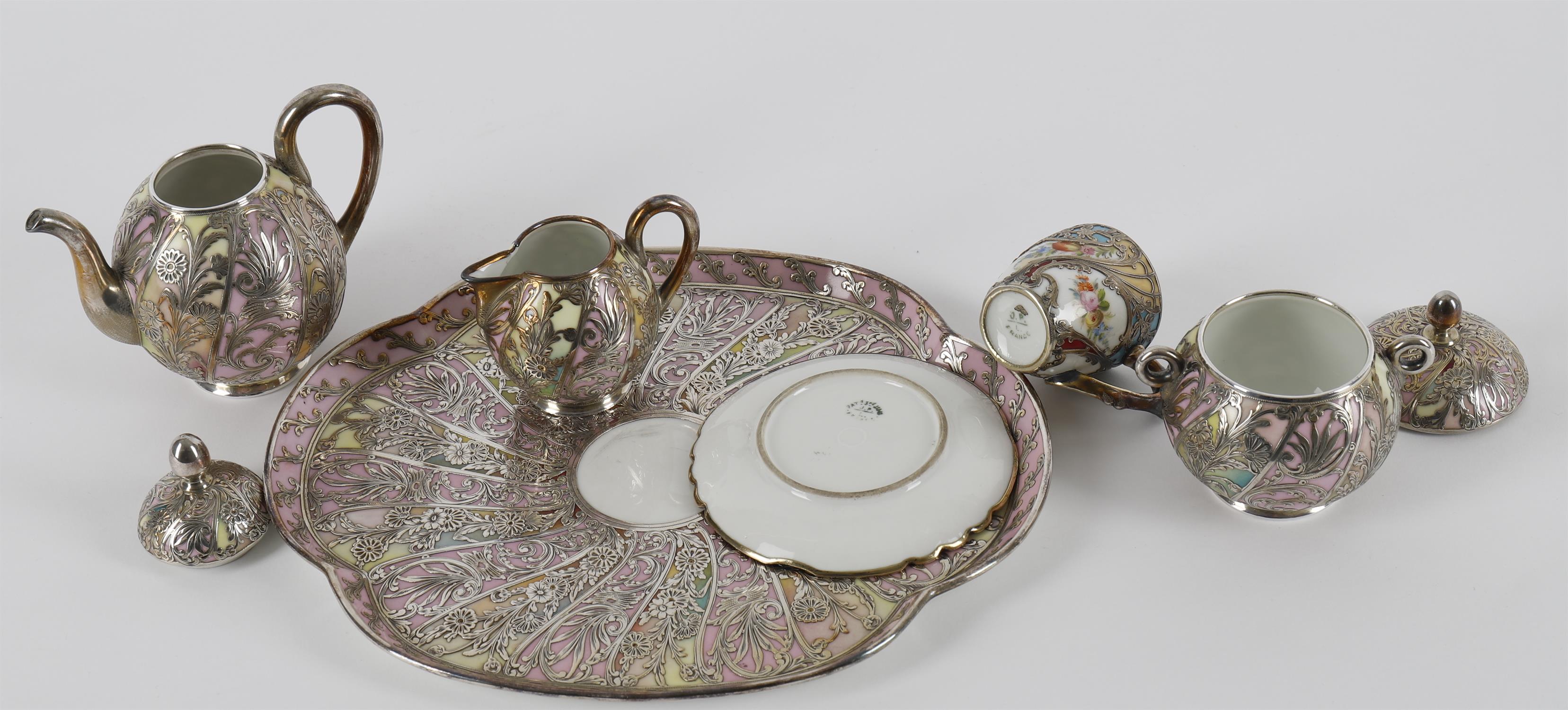 A matched Limoges porcelain and white metal overlaid five piece cabaret set - Image 5 of 6