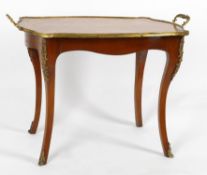 An early 20th century French mahogany and floral inlaid gilt metal mounted tray table