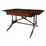 A Regency mahogany and boxwood strung sofa table