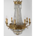 A late 19th/early 20th century gilt metal and cut glass chandelier