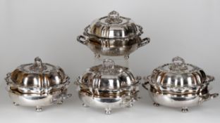 A suite of four Old Sheffield plated serving dishes stands and covers