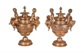 A pair of gilt metal vases in Neoclassical style