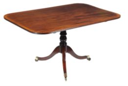 A Regency style mahogany breakfast table