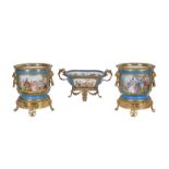 A pair of French porcelain Sevres-style gilt-metal mounted seaux a bouteilles (bottle coolers)