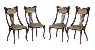 A pair of George II style carved mahogany side chairs